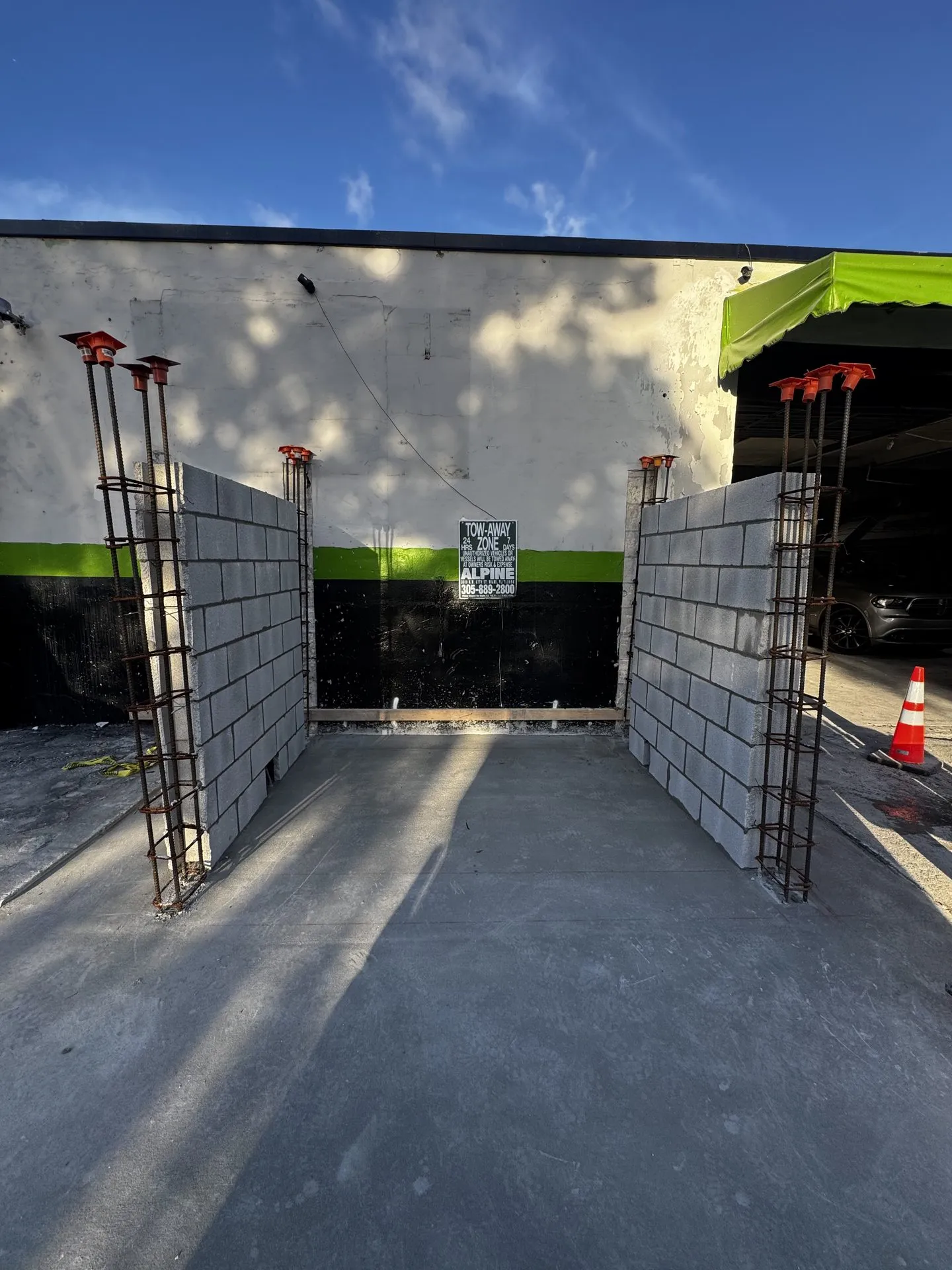 Concrete block columns with rebar at a commercial storefront project