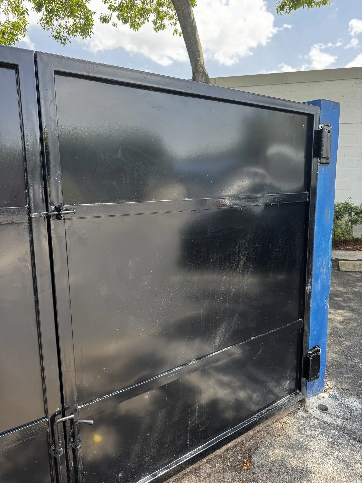 Custom steel gate panel for a commercial dumpster enclosure
